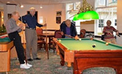 New Horizons residents playing pool
